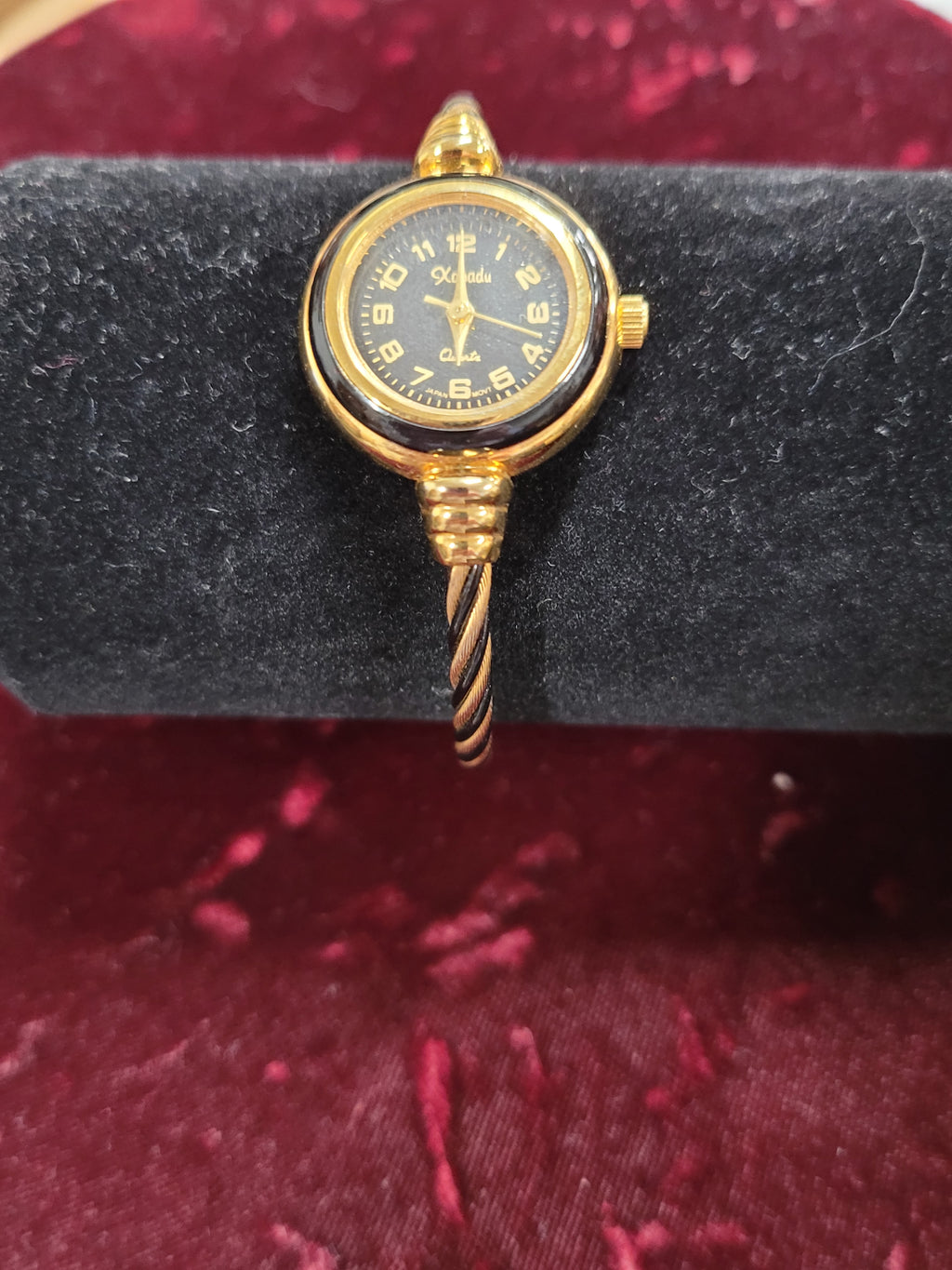 Xanadu flex-band black and gold ladies wrist watch