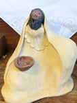 Navajo statuette,woman w bowl of maize, artist signed